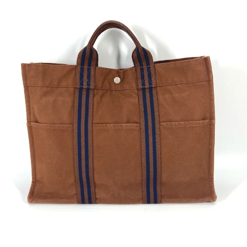 Handle bags with minimalist sleek silhouettes -Hermes  Cloth Tote Bag (Pre-Owned)