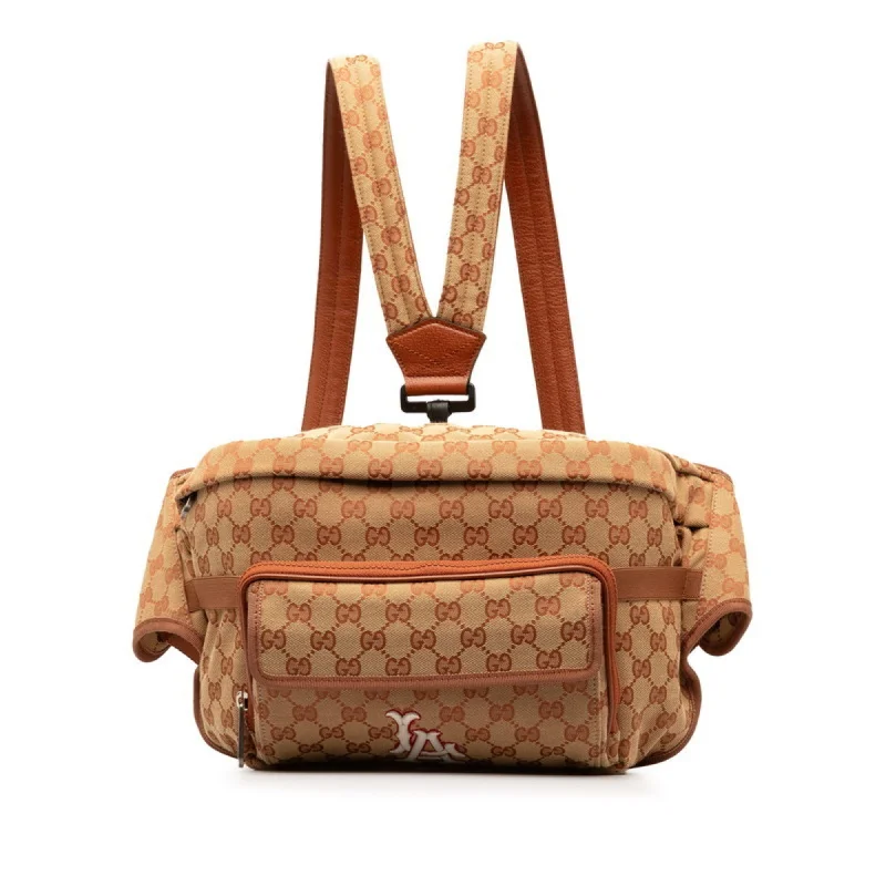 Handle bags with quilted leather for luxury -Gucci  Gg Canvas Leather Backpack Sling Bag (Pre-Owned)