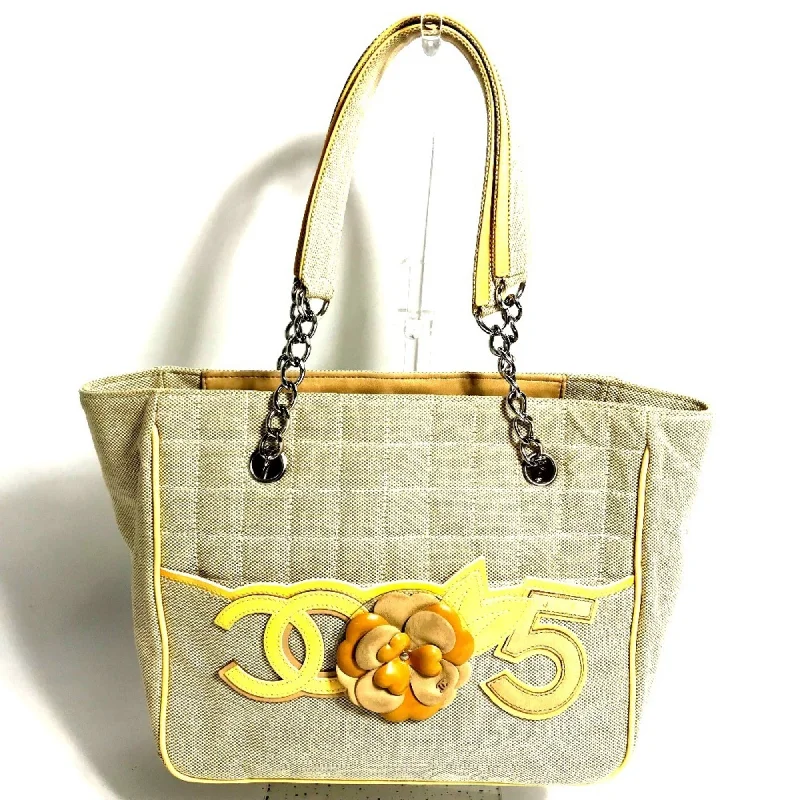 Handle bags with minimalist sleek silhouettes -Chanel  yellow Canvas Leather Shoulder Bag Tote Bag (Pre-Owned)