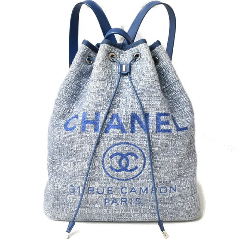 Handle bags with expandable sides for flexibility -Chanel Cotton Canvas blue Backpack (Pre-Owned)