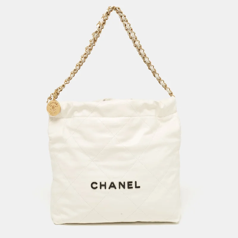 Handle bags with playful pom-poms for charm -Chanel Off White Quilted Leather 22 Bag