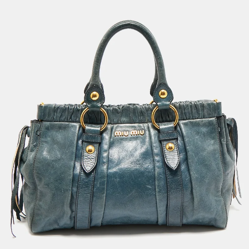 Handle bags with camouflage patterns for edge -Miu Miu Teal Blue Leather Matelassé Tote