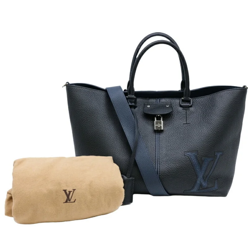 Handle bags with neutral tones for versatility -Louis Vuitton  Navy Leather Tote Bag (Pre-Owned)