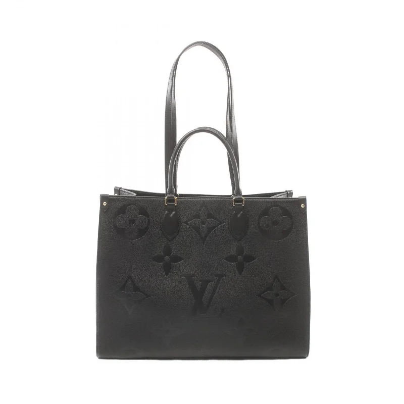 Handle bags with bohemian tassel embellishments -Louis Vuitton  Leather Tote Bag (Pre-Owned)