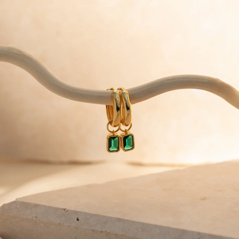 Hoop earrings with snake print designs for an edgy, wild appearance-Dangling Emerald Birthstone Hoops