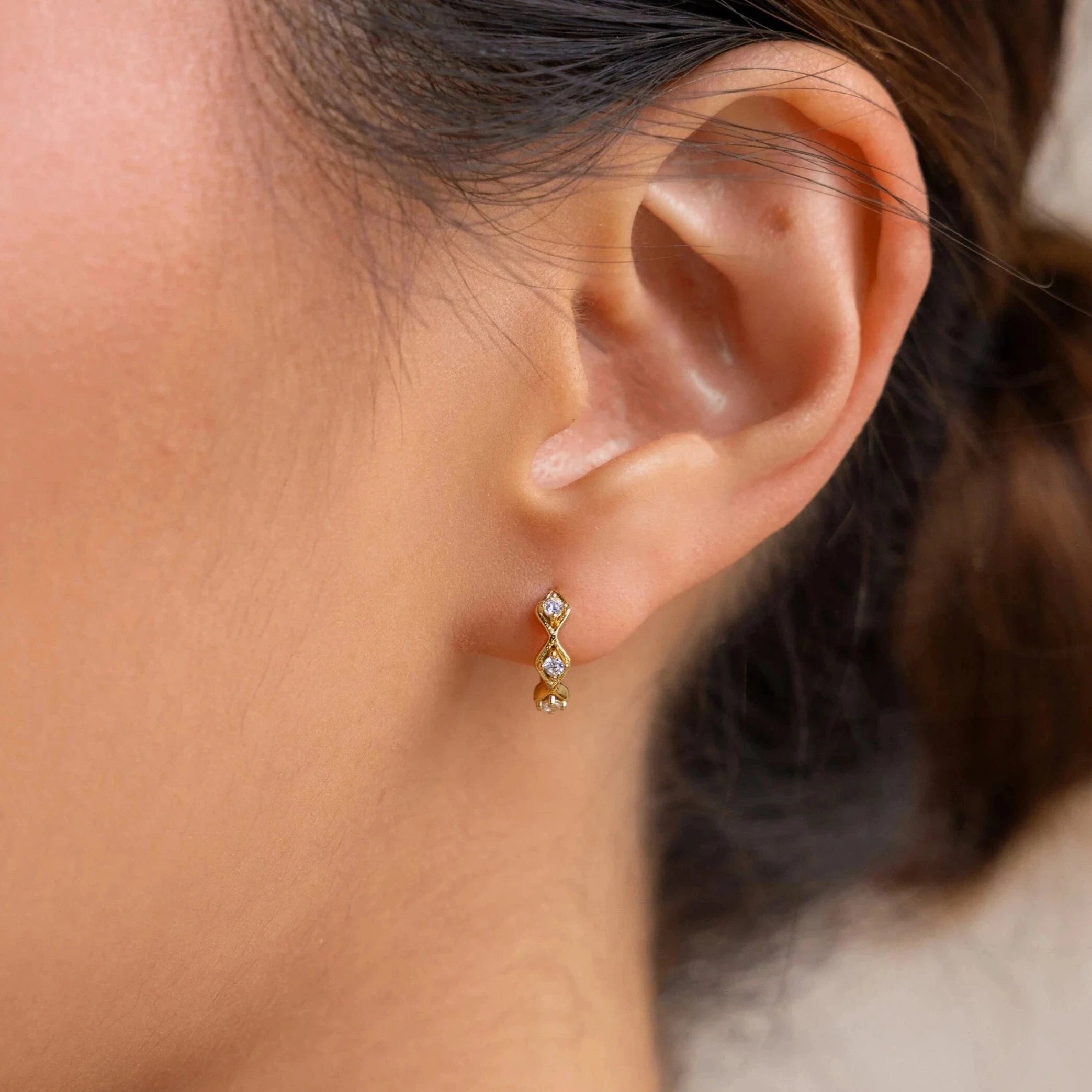 Best hoop earrings with sparkling cubic zirconia for a brilliant, budget-friendly effect-Ericka Diamond Tennis Huggies