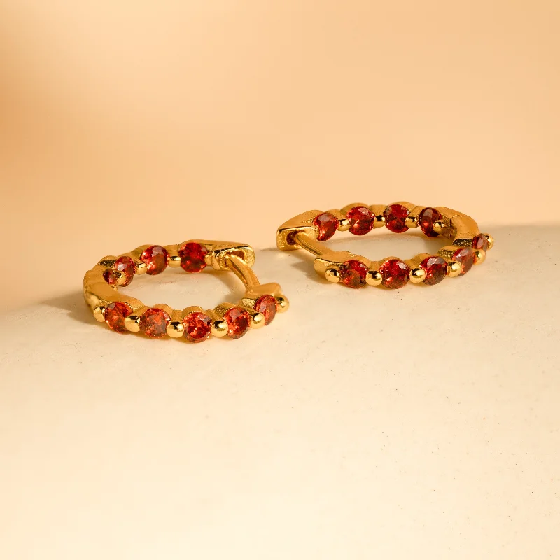 Hoop earrings with spiral designs for a dynamic and fluid look-Inside Out Garnet Huggies