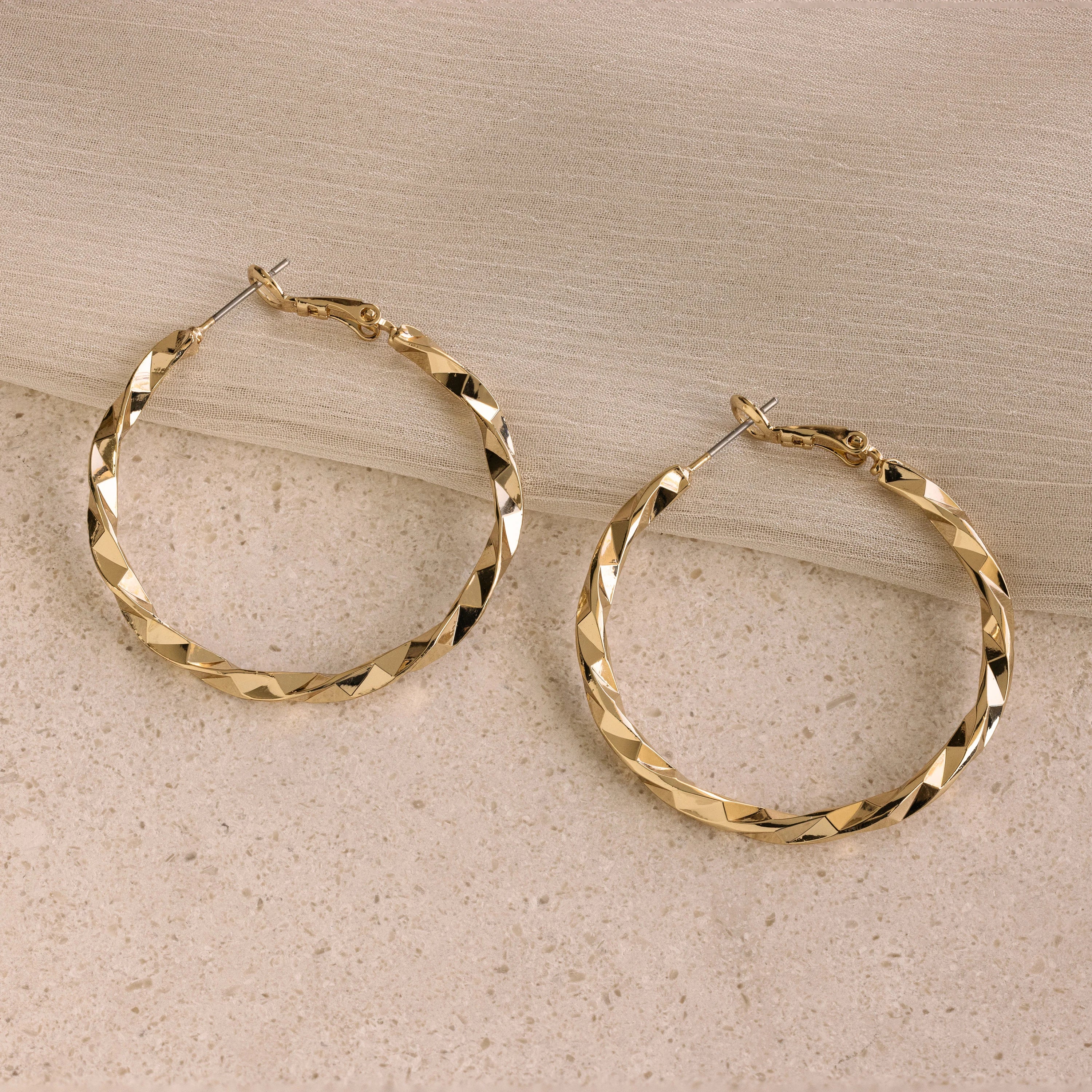 Best hoop earrings with braided leather for a rustic, stylish finish-Large Twisted Hoops