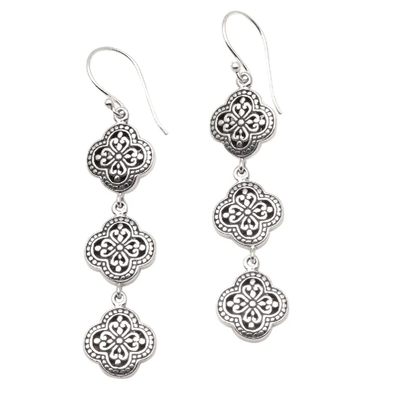 Best hoop earrings with matte finish for a sophisticated, understated design-NOVICA Four-Petaled Flowers, Sterling silver dangle earrings - 2.5*0.5