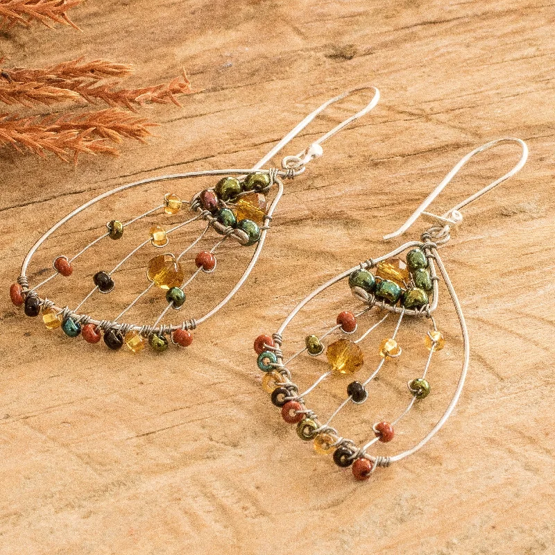 Hoop earrings with polished silver finish for a shiny, modern appeal-Novica Handmade Earthy Wings Of Freedom Beaded Dangle Earrings