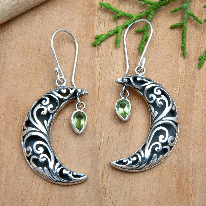 Hoop earrings with gold accents for a warm, elegant statement piece-Novica Handmade Fortune Night Peridot Dangle Earrings