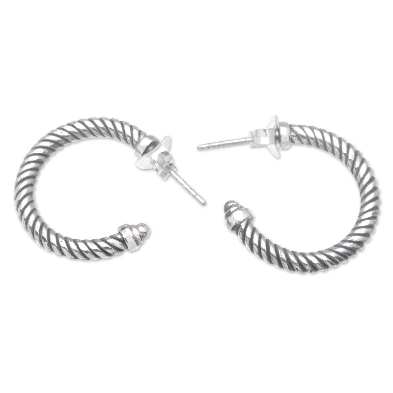 Best hoop earrings with cubic zirconia for a budget-friendly, dazzling look-Novica Handmade Spiral Love Sterling Silver Half-Hoop Earrings