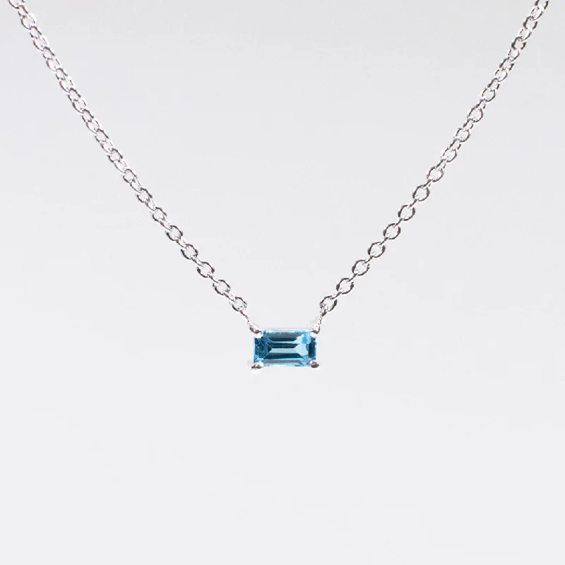 Best necklaces and pendants with butterfly wings for a delicate, graceful style-Silver Baguette Solitaire Blue Topaz Necklace